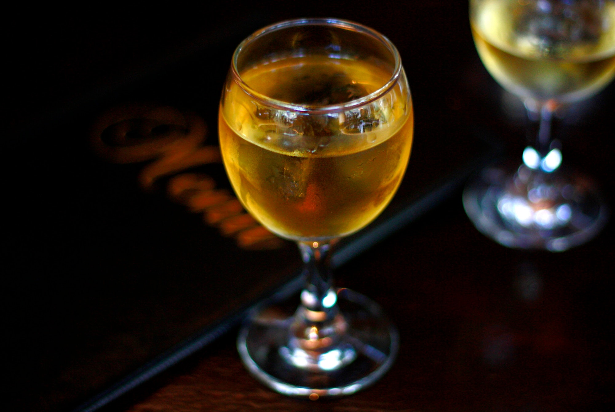 A glass of alcohol, close up